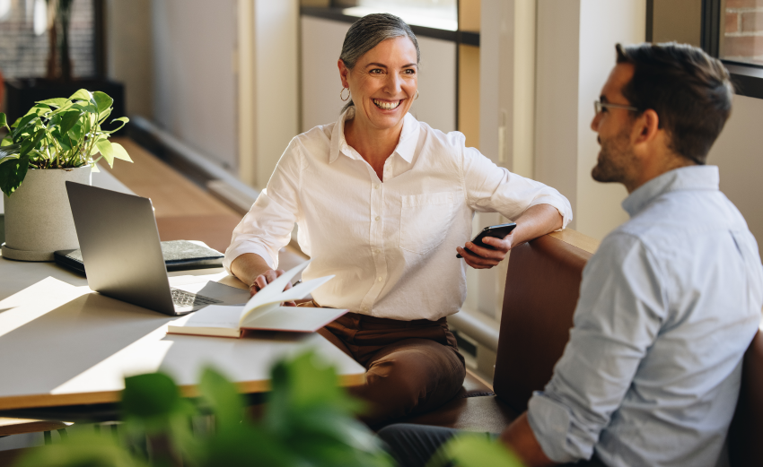 L&D manager communicating her assessment for training needs in language and business coaching to an employee.