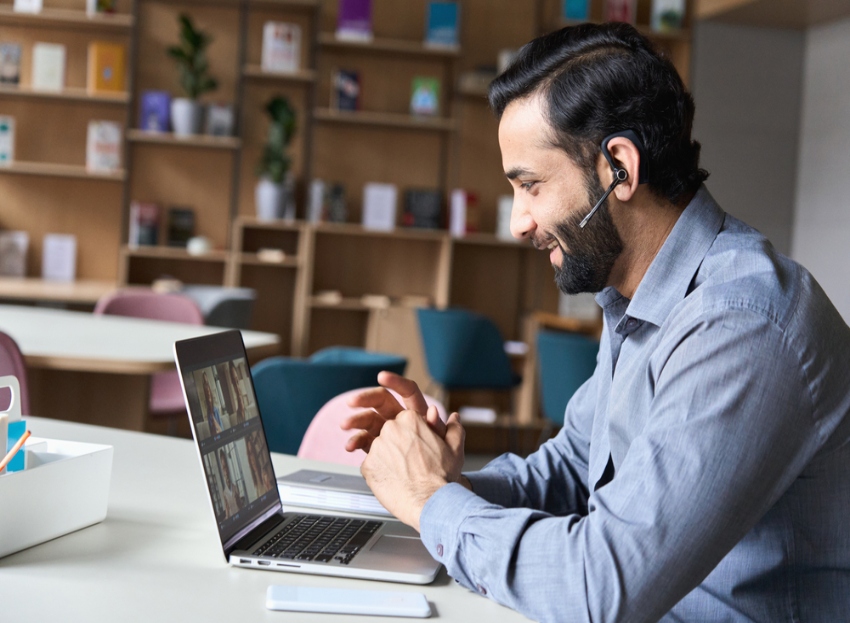 Man communicating on laptop