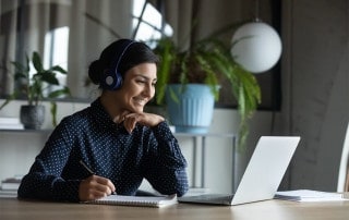 young professional woman attending a digital event