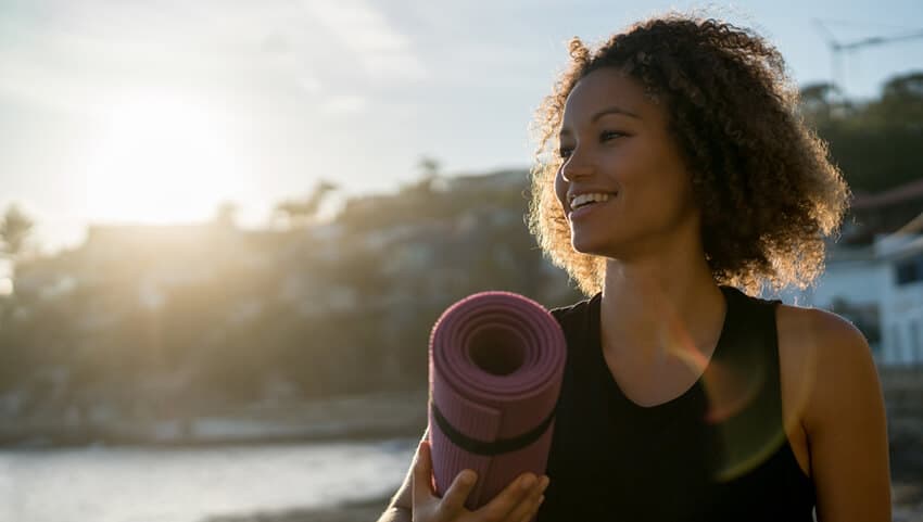 woman doing yoga as her fake commute