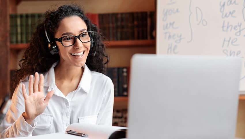 a female learning executive talking to someone over a video call