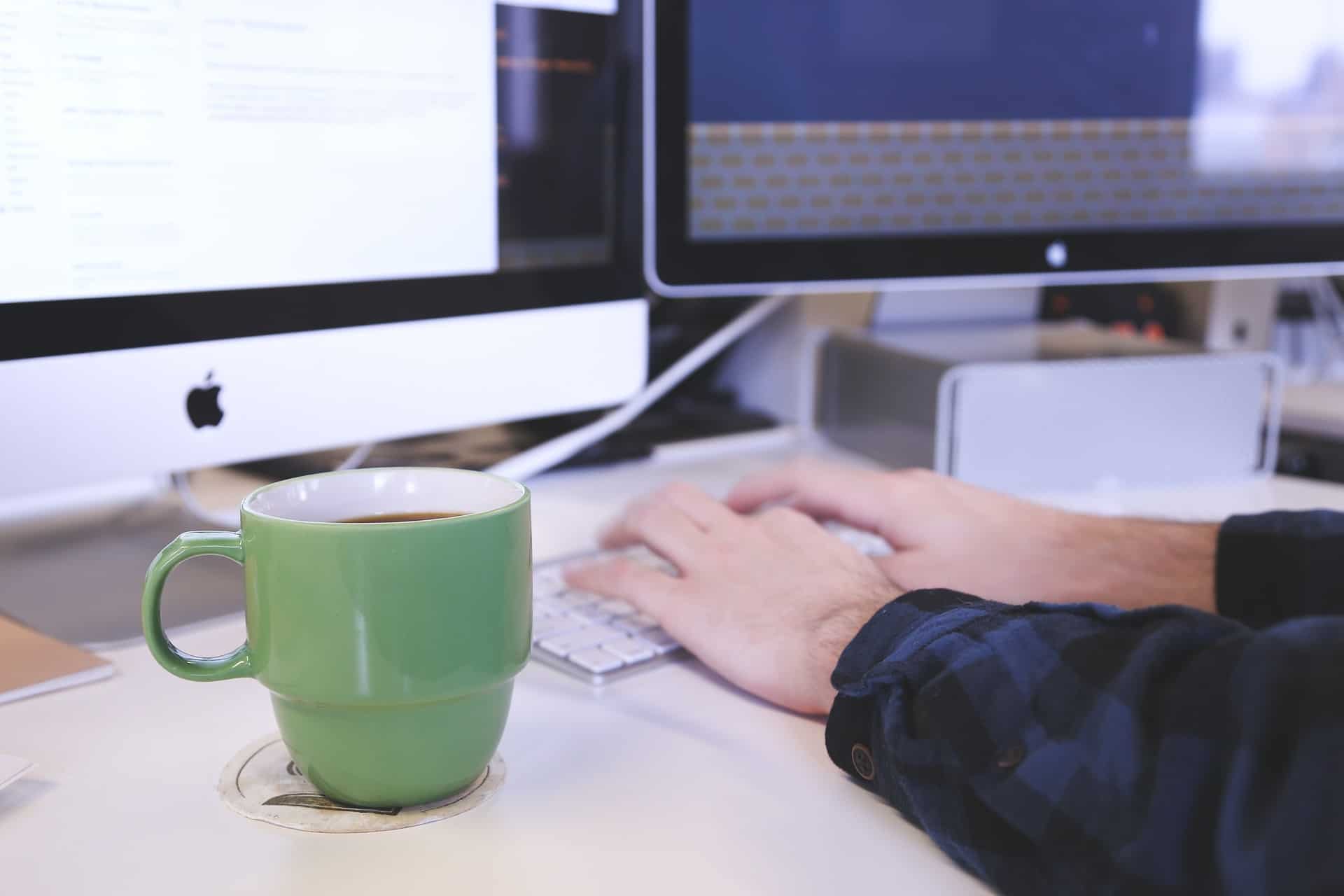 person engaging with their digital training on their laptop